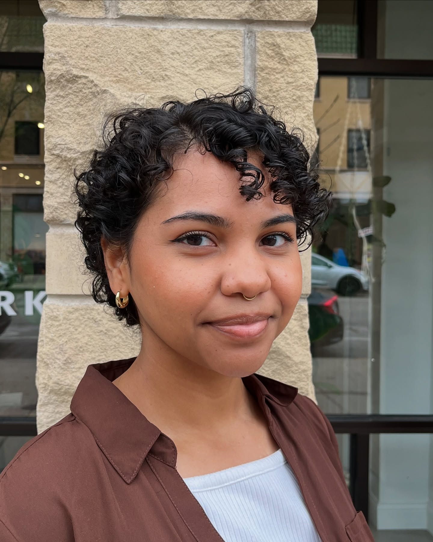 Elegant short spiral curls with volume