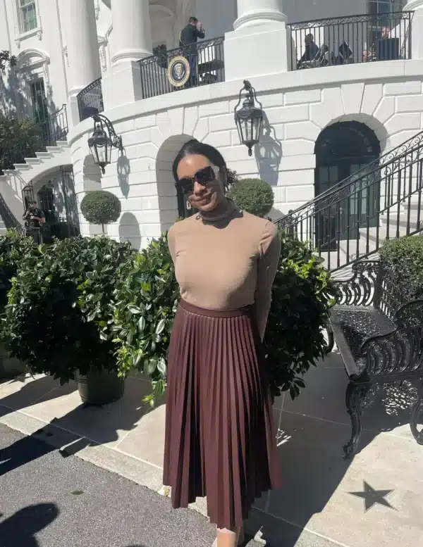 Pleated Leather Skirt with a Turtleneck capsule wardrobe outfit