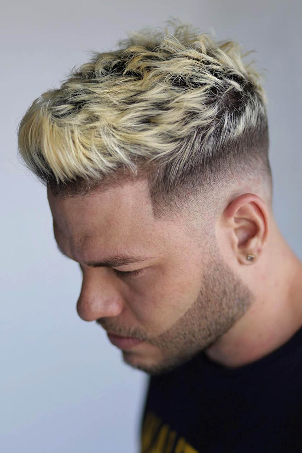 Spiky haircut with frosted blonde tips on a man