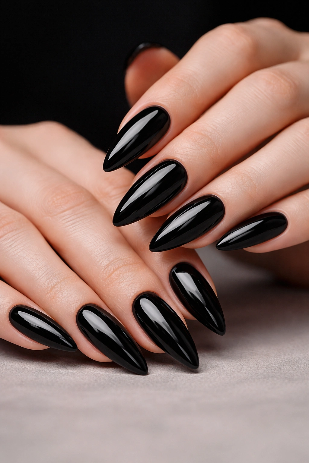 Glossy Black Almond Nails photo