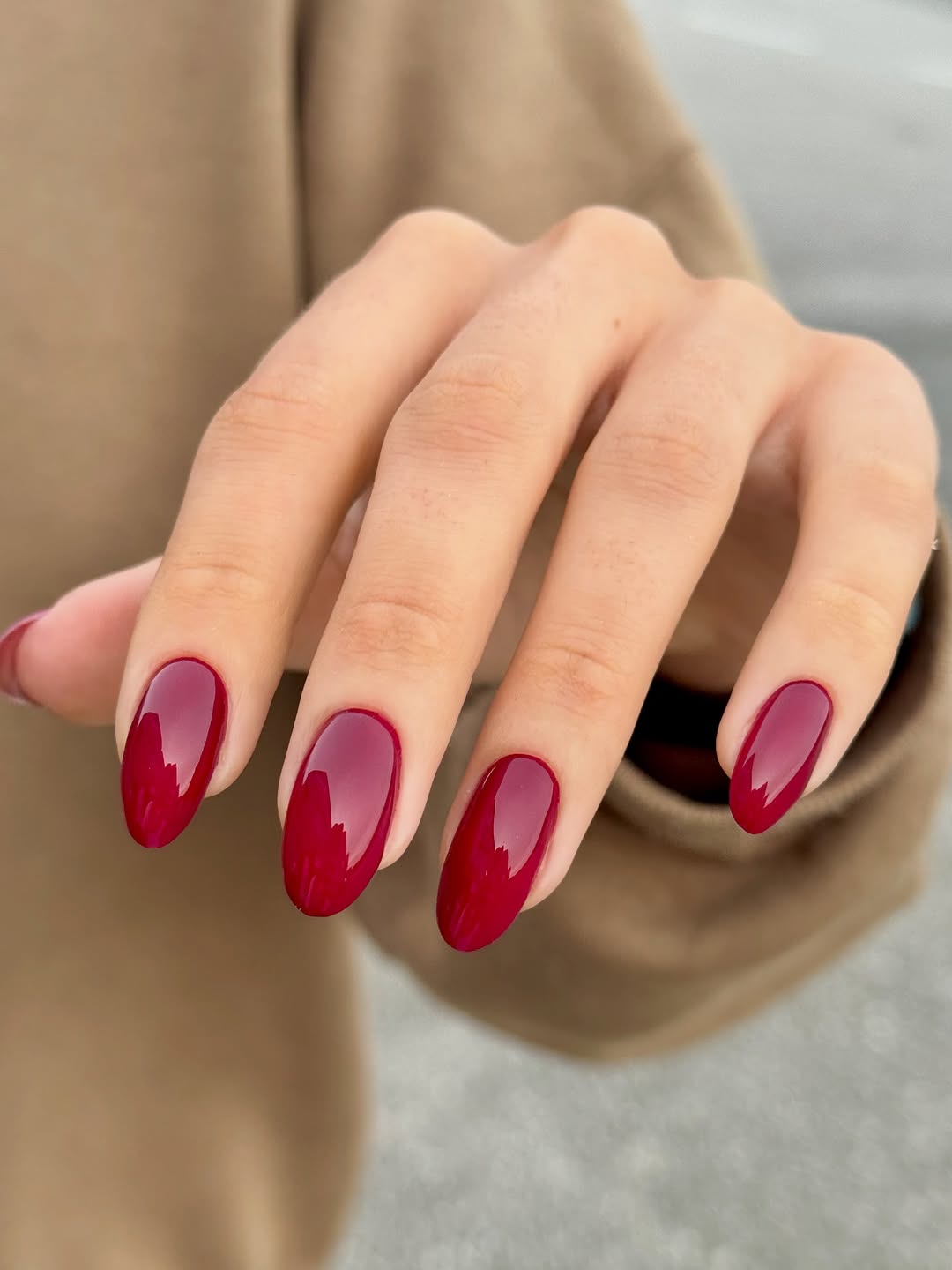 Vibrant Classic Red on an Oval Shape red nail design