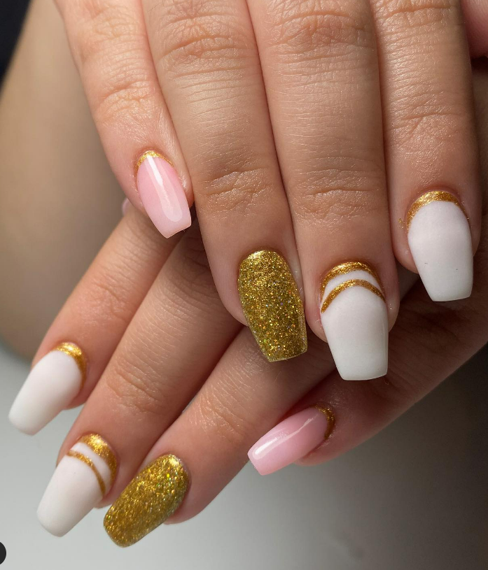 Gold and Nude Glitter Party Nails new years eve nails design