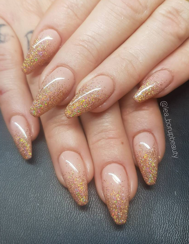 Soft Gold Glitter on Nude Nails new years eve nails design