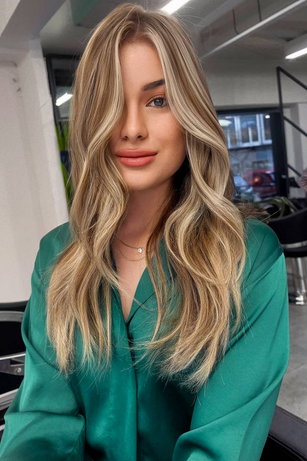 Golden ash blonde balayage on medium to long hair