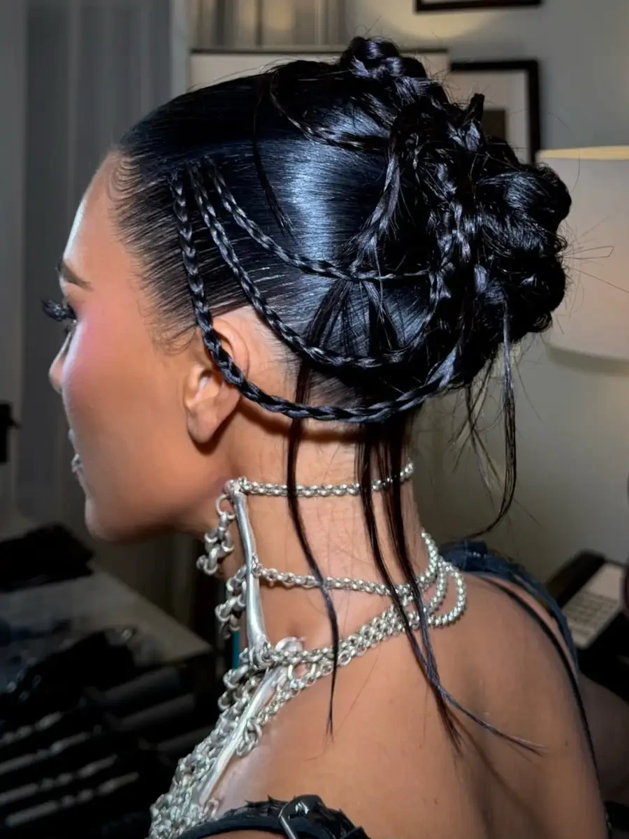 Wet-look braided topknot hairstyle