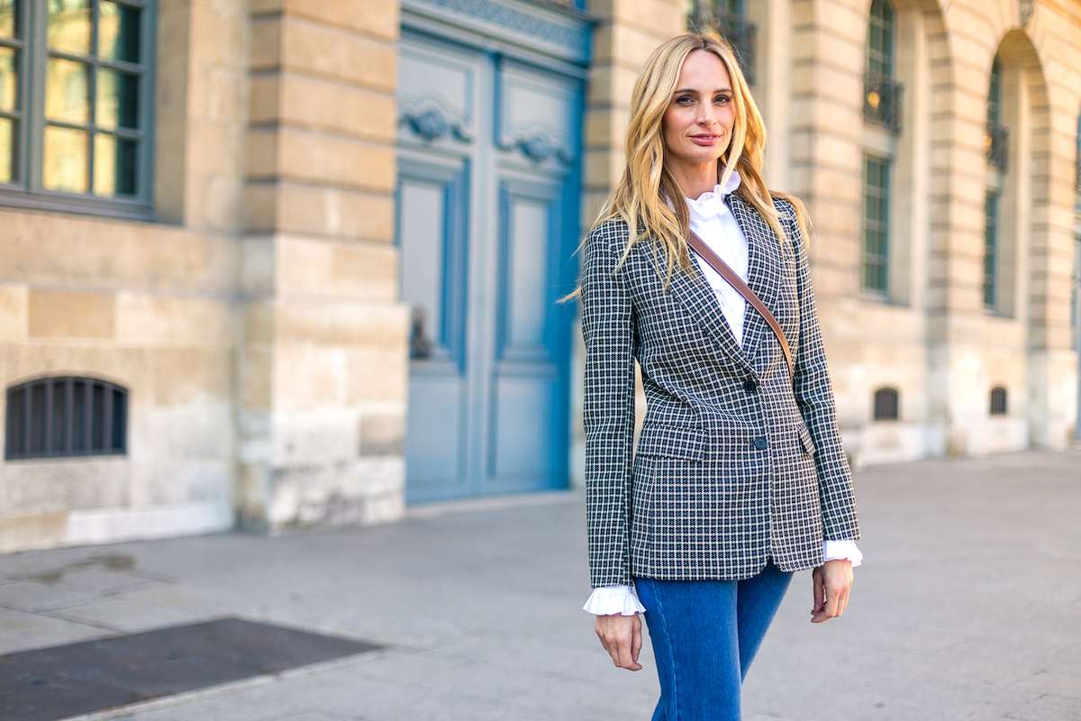 Plaid blazer worn over a turtleneck with jeans