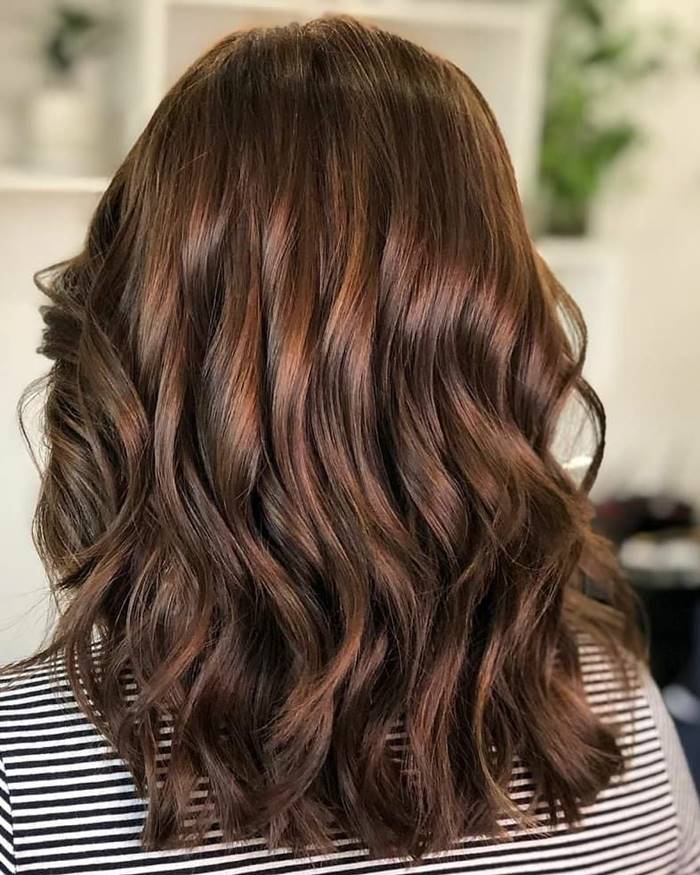Cinnamon babylights on brunette hair