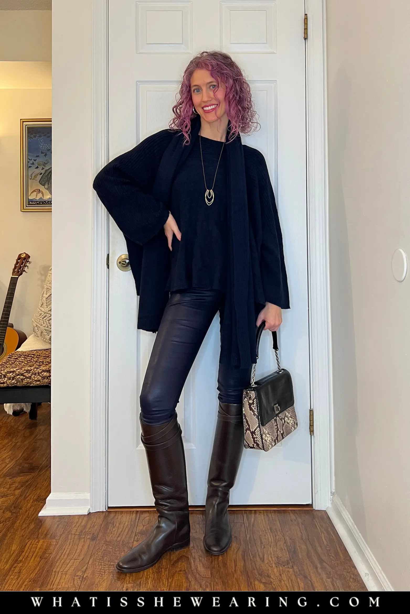 Monochrome navy knit and riding boots with leather leggings
