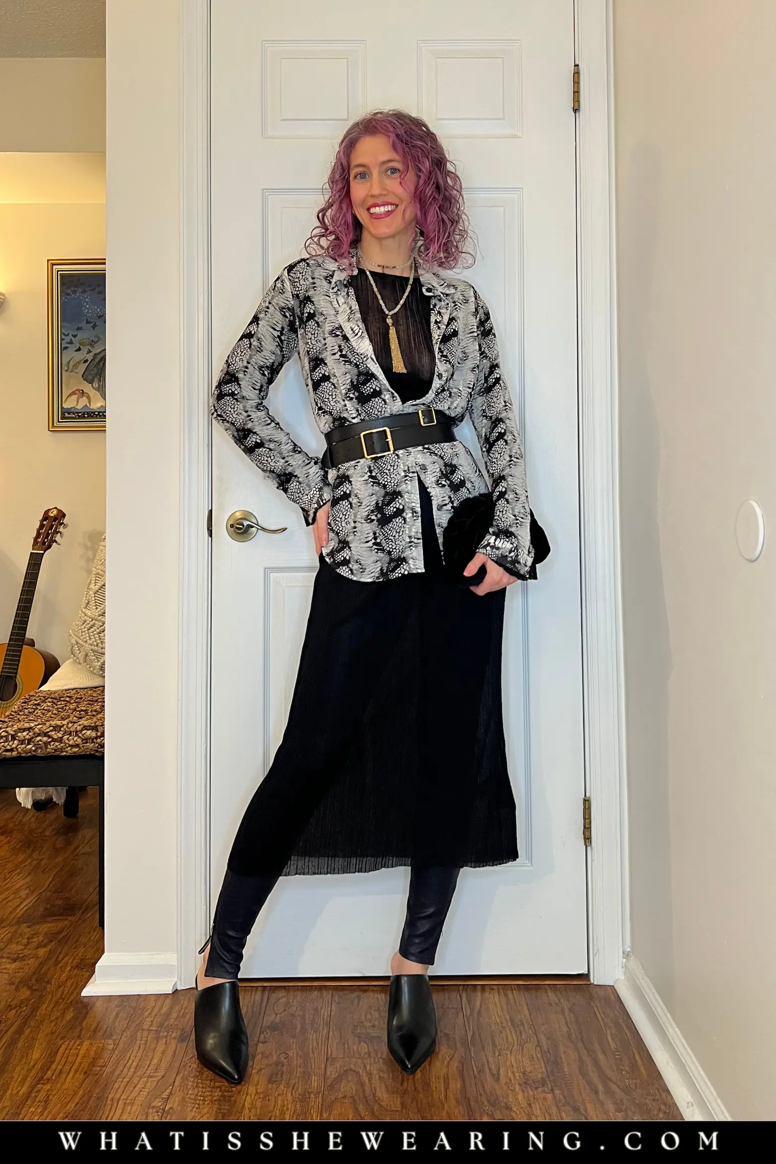 Sheer layered top over leather leggings