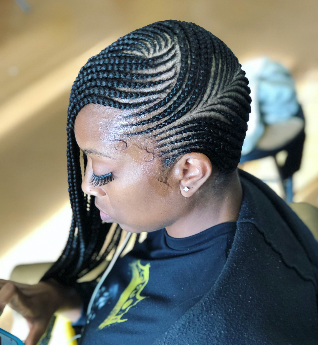 Lemonade braids hairstyle with side part