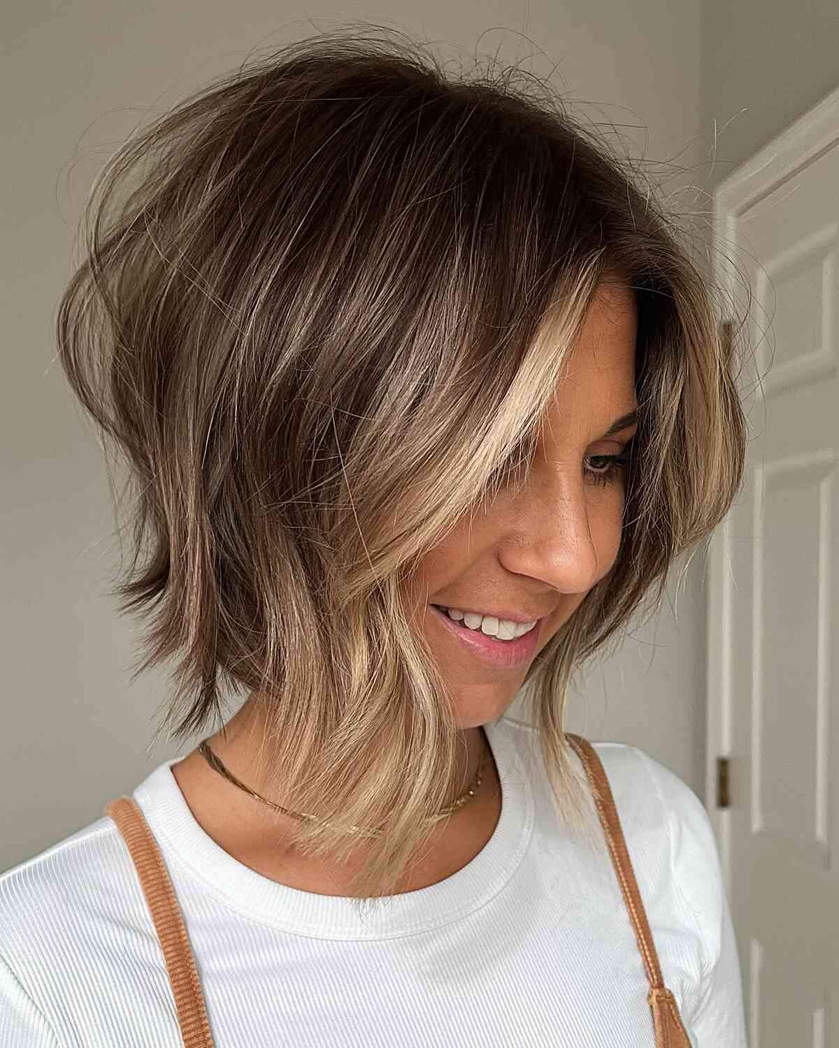 Lived-In Brunette Bob with a Bright Money Piece layered bob haircut