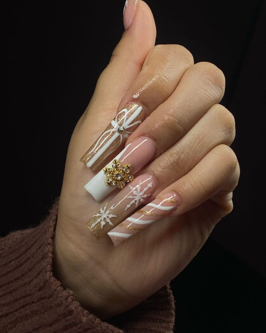 Gold and White Snowflake Glam subtle Christmas nail design