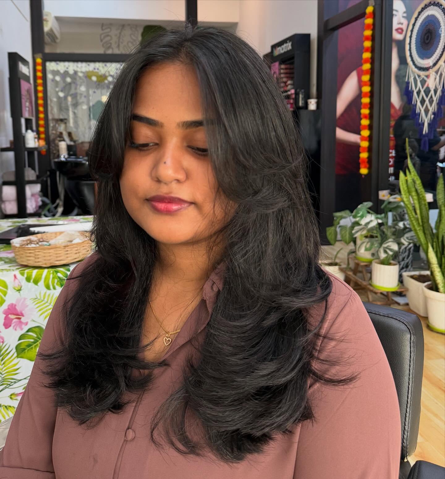 Raven Layers with Soft Curtain Bangs face framing bangs hairstyle