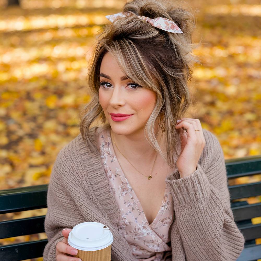 Messy Bun Tied With a Ribbon Scrunchie winter hairstyle