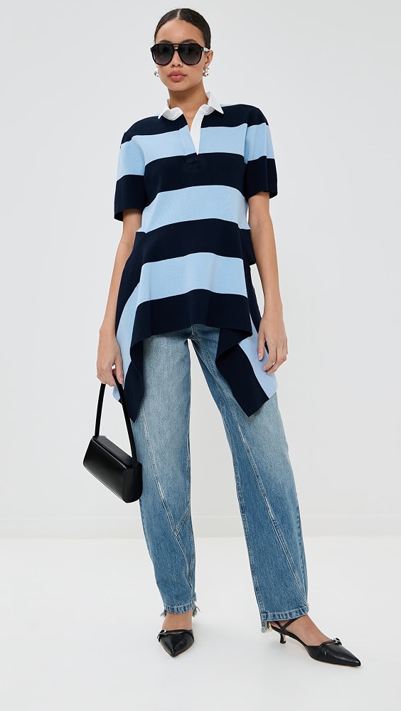 Striped navy and blue polo shirt with baggy light wash jeans errands outfit
