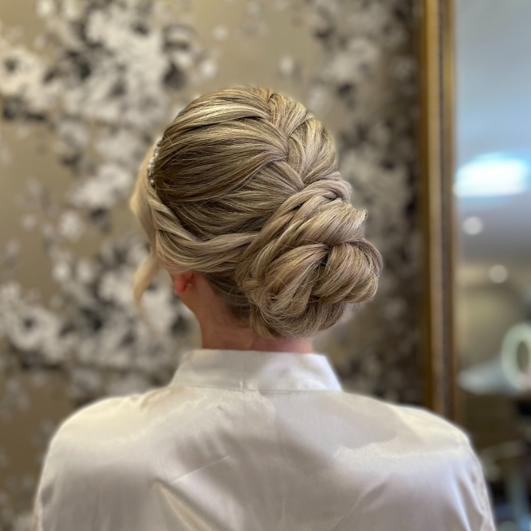 Neat Dark Brown Twist Bun twist updo hairstyle