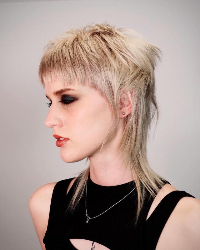 Mullet pixie with sleek bangs pixie haircut