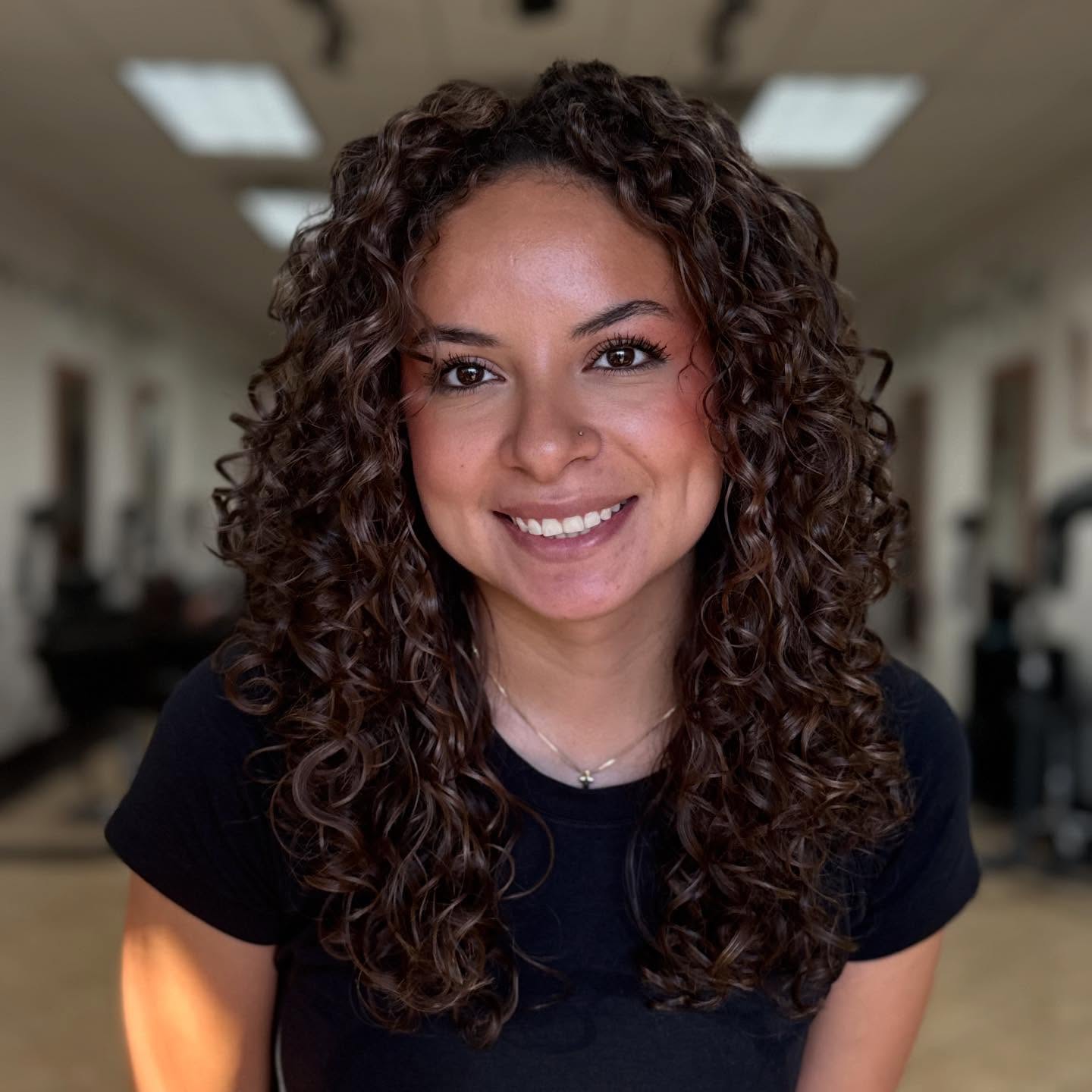 Natural curly layers with soft face framing
