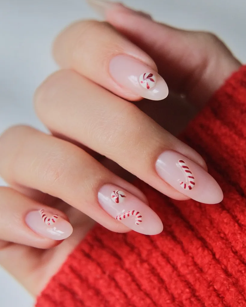 Glossy Candy Cane Stripes on Almond Nails almond Christmas nail manicure