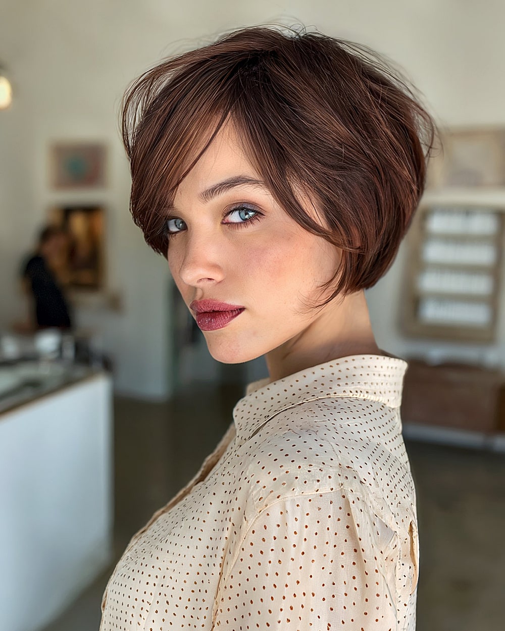 Stacked pixie bob with rounded back layers for added fullness