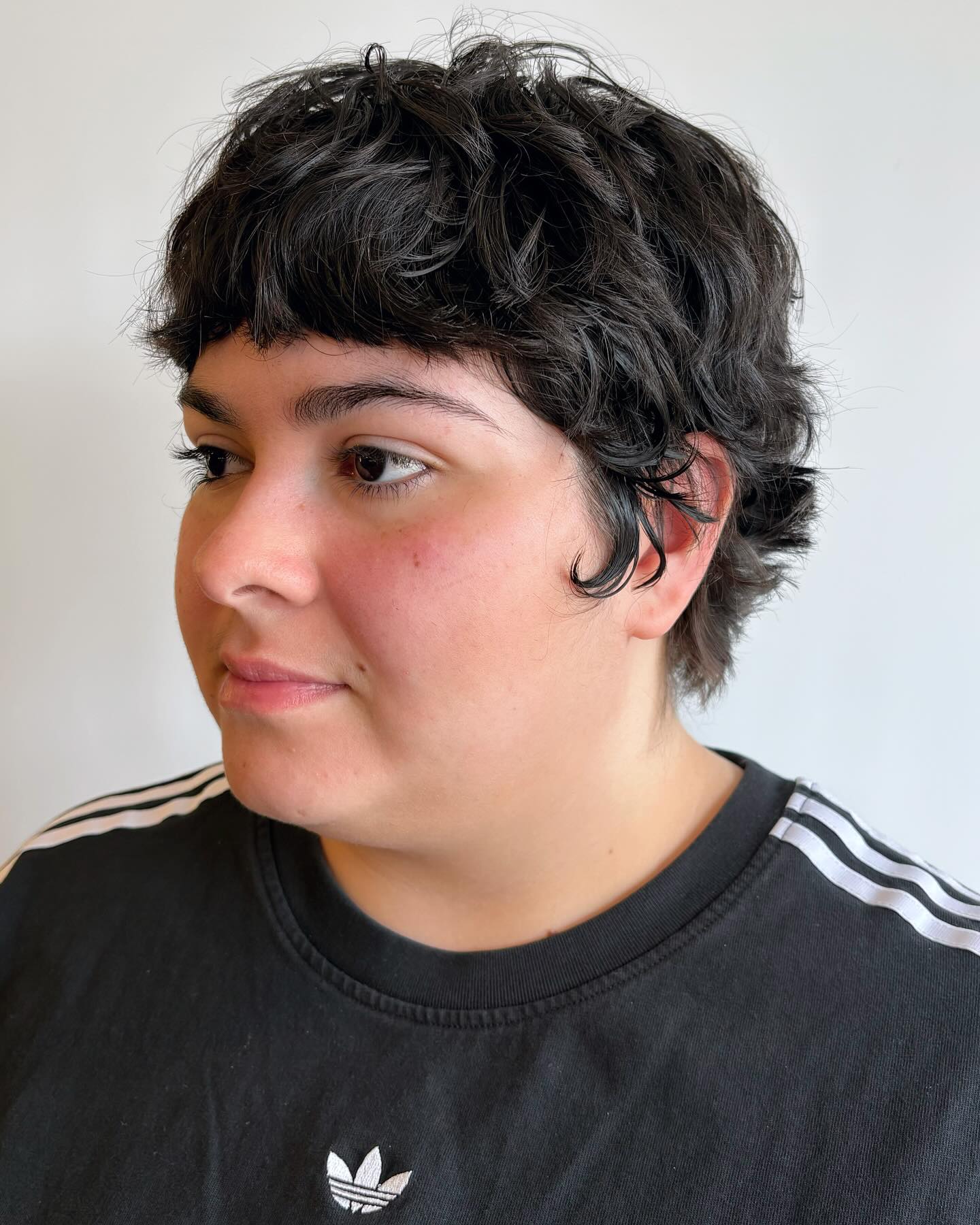 Playful textured curly bob with lifted curls