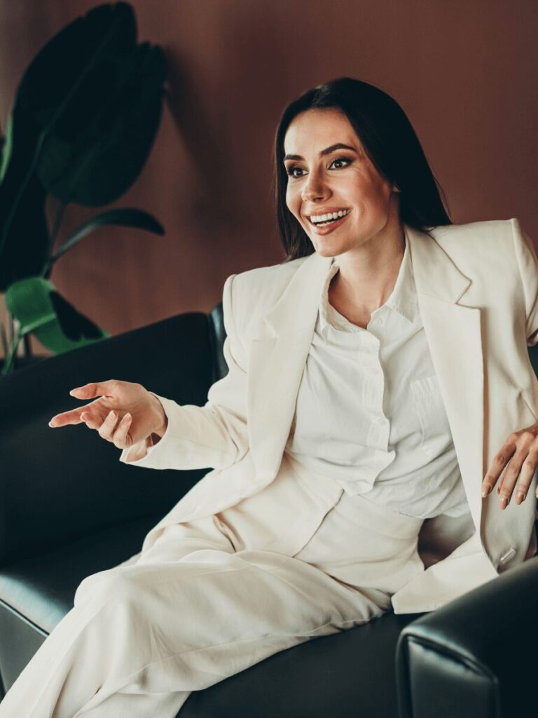 Tailored pantsuit in dark neutral job interview outfit