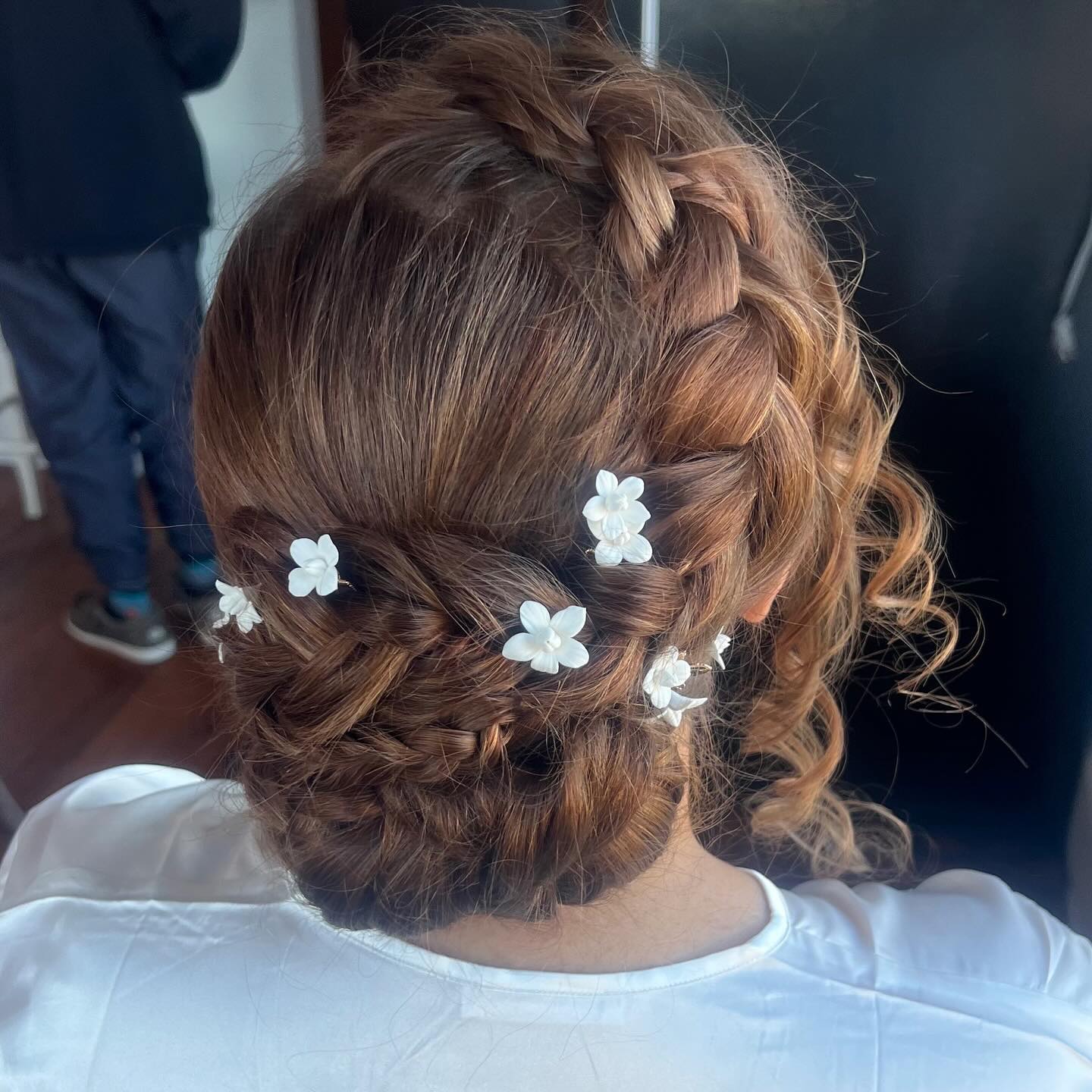 Braided Twist Updo with a Fresh Flower twist updo hairstyle