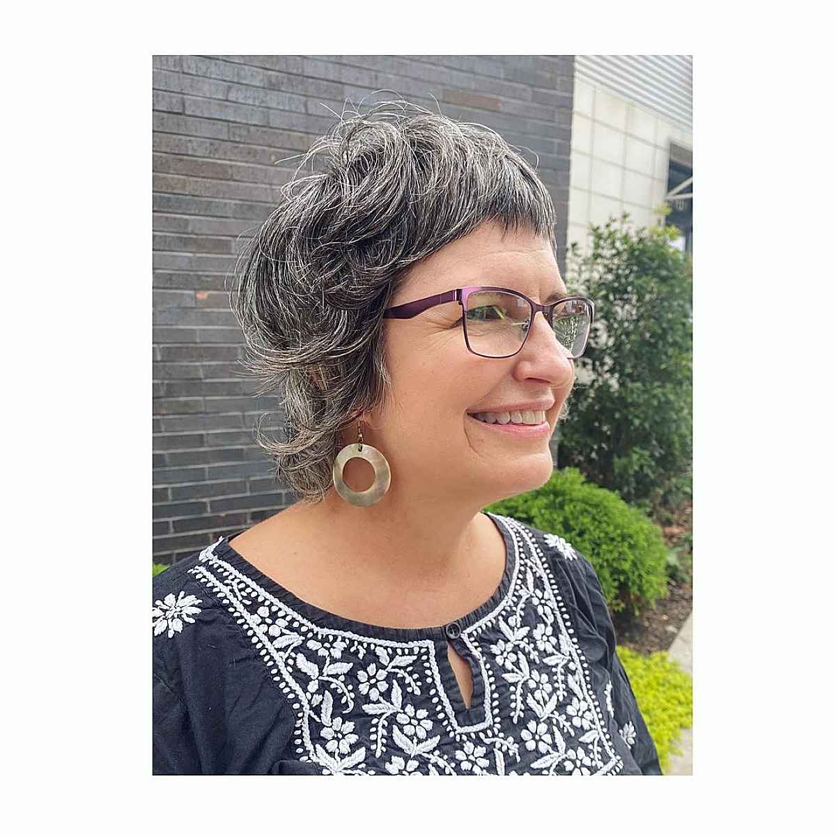 Salt-and-pepper short shag haircut for women over 60