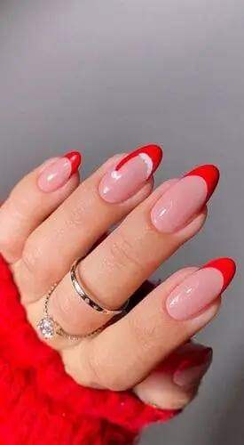 Santa Hat French Tips on a Neutral Base santa hat nail design