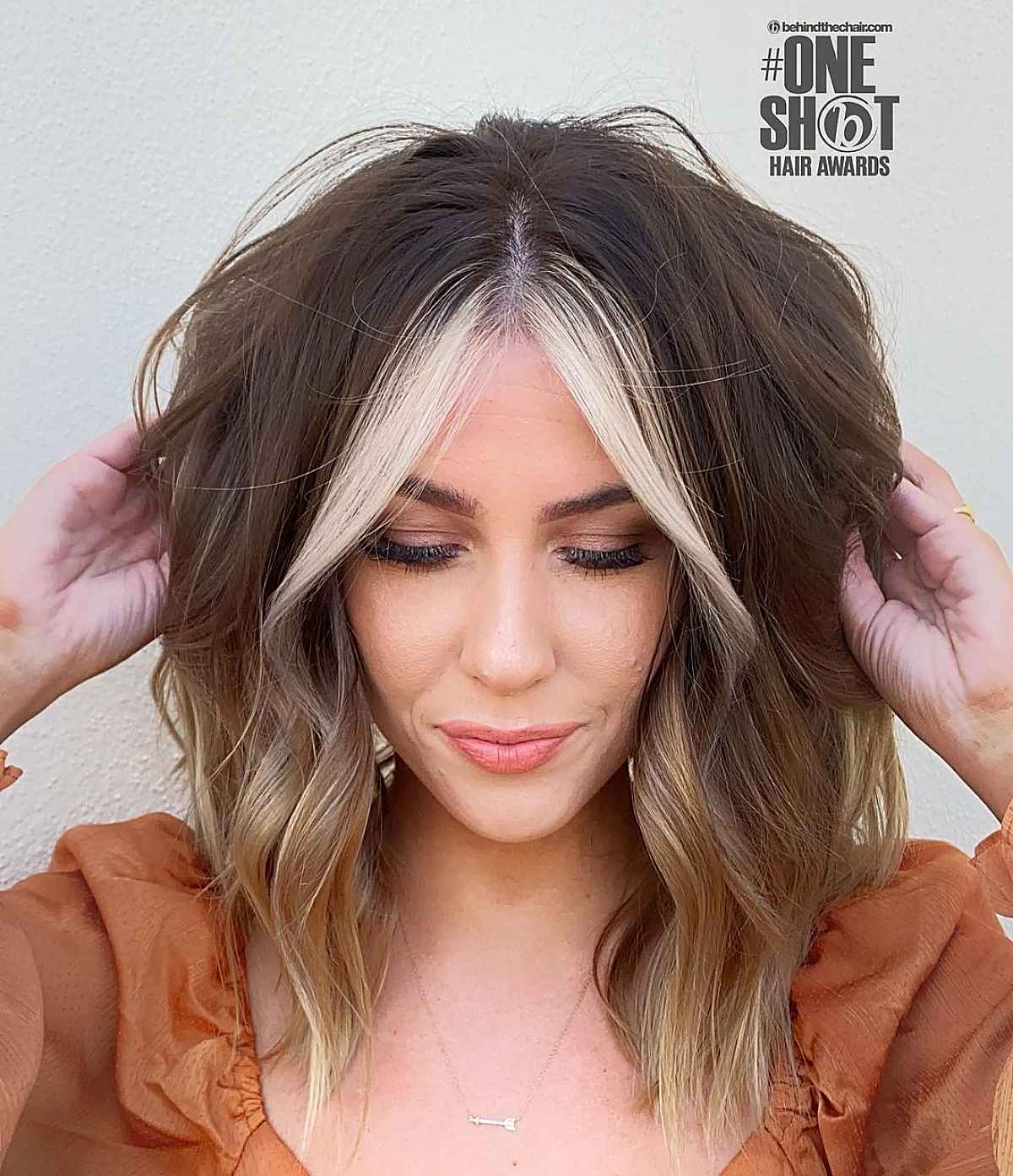 Shag with sun-kissed highlights medium hair