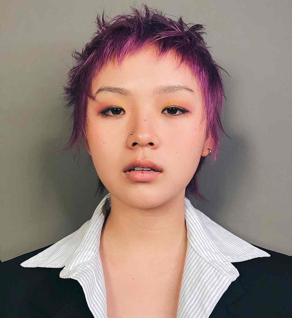 Vibrant short messy pixie Asian haircut