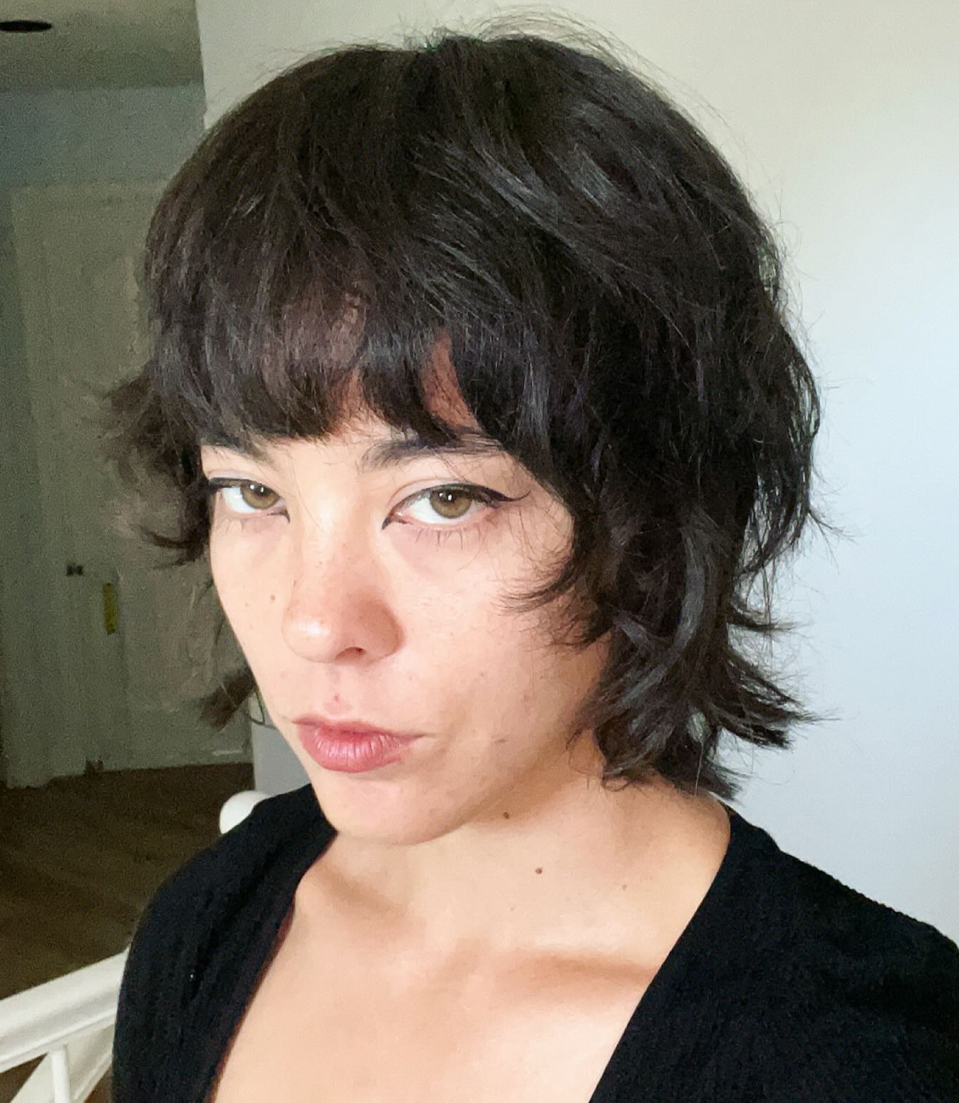 Short shaggy wolf cut with soft blunt fringe