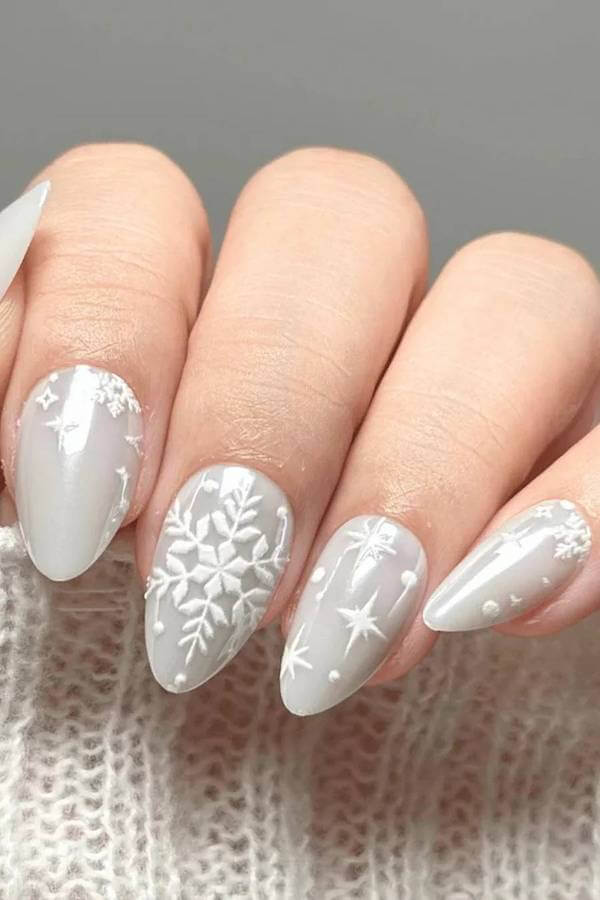 Milky White Almond Nails With Lace Snowflakes snowflake nail design