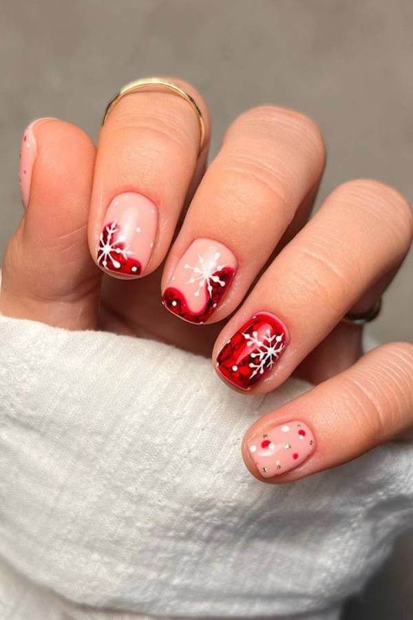 Short Red Nails With Snowflake Designs snowflake nail design