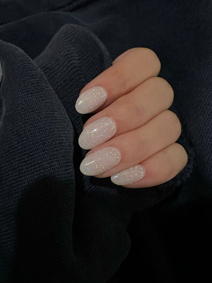 Snow-Glitter White Ovals simple winter nail manicure
