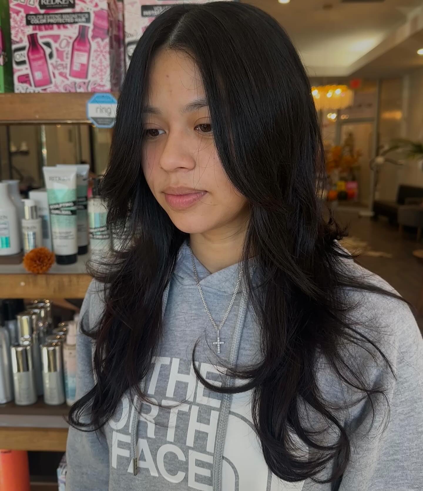 Sleek Cascading Layers with Tousled Curtain Bangs face framing bangs hairstyle