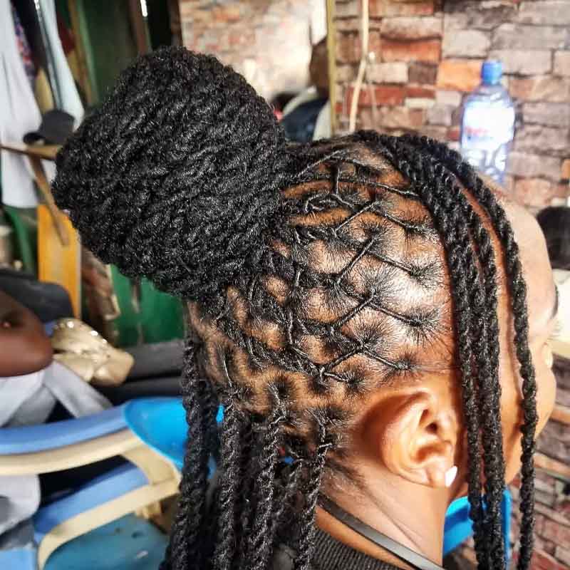 Small barrel twists in a half-up loc style
