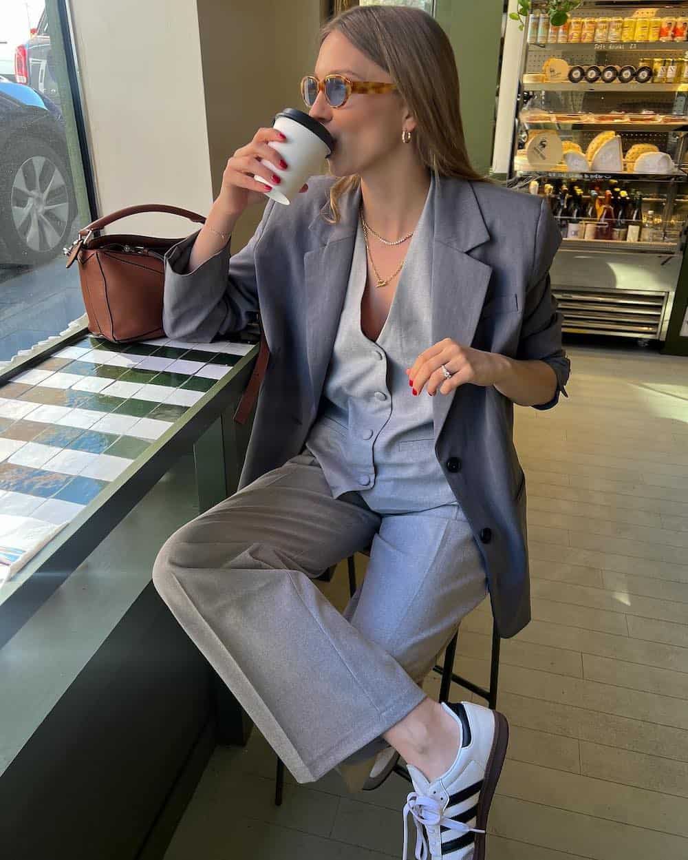 Matching suit vest and trousers with an oversized blazer work outfit