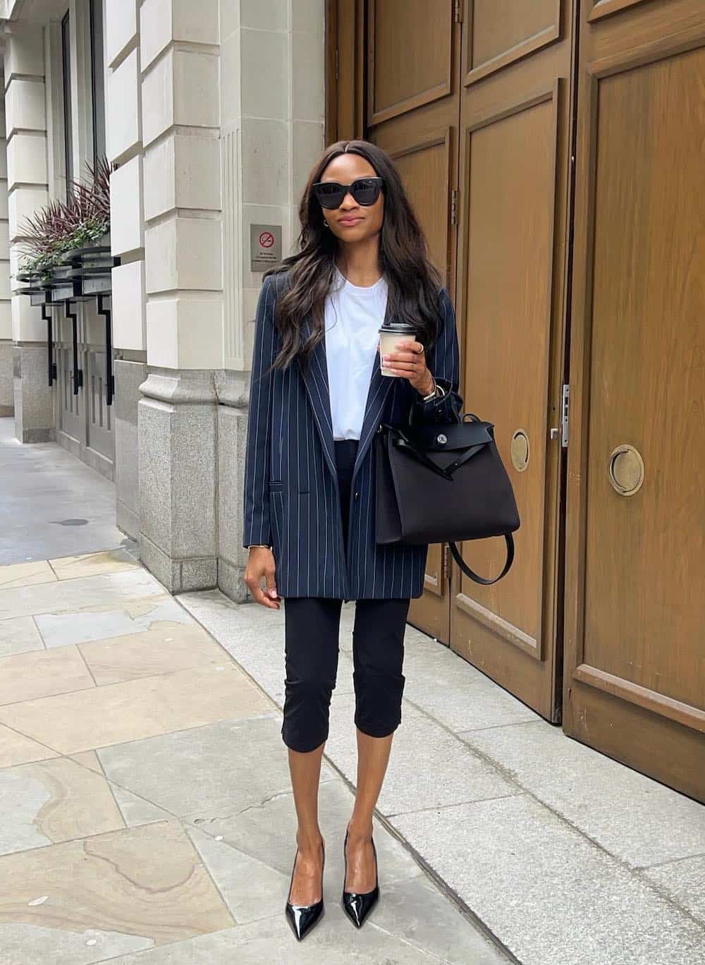 Capri trousers with a pinstripe blazer and white tee work outfit