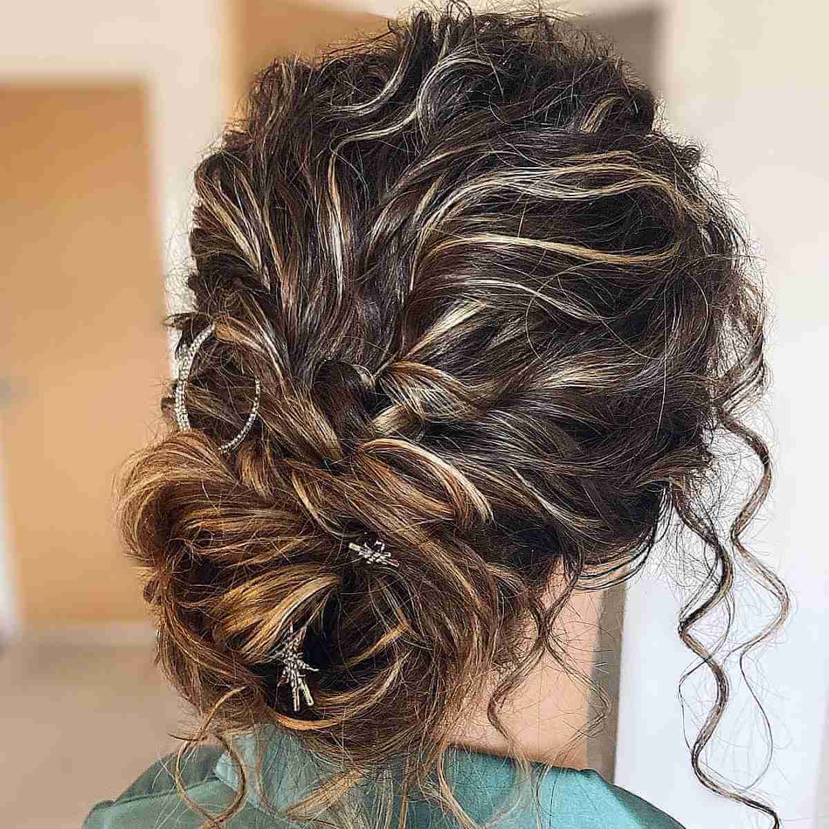 Braided curly bun updo