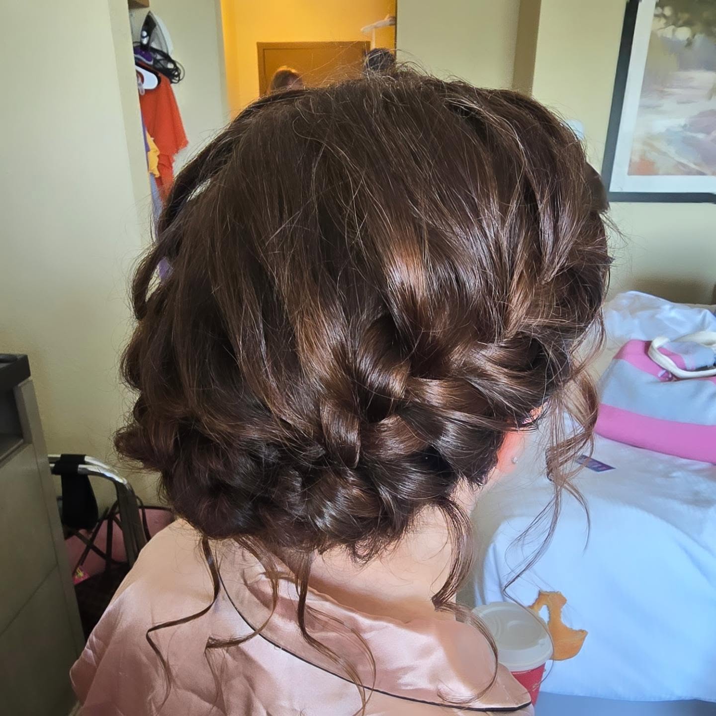 Textured Ash Blonde Updo with Loose Tendrils twist updo hairstyle