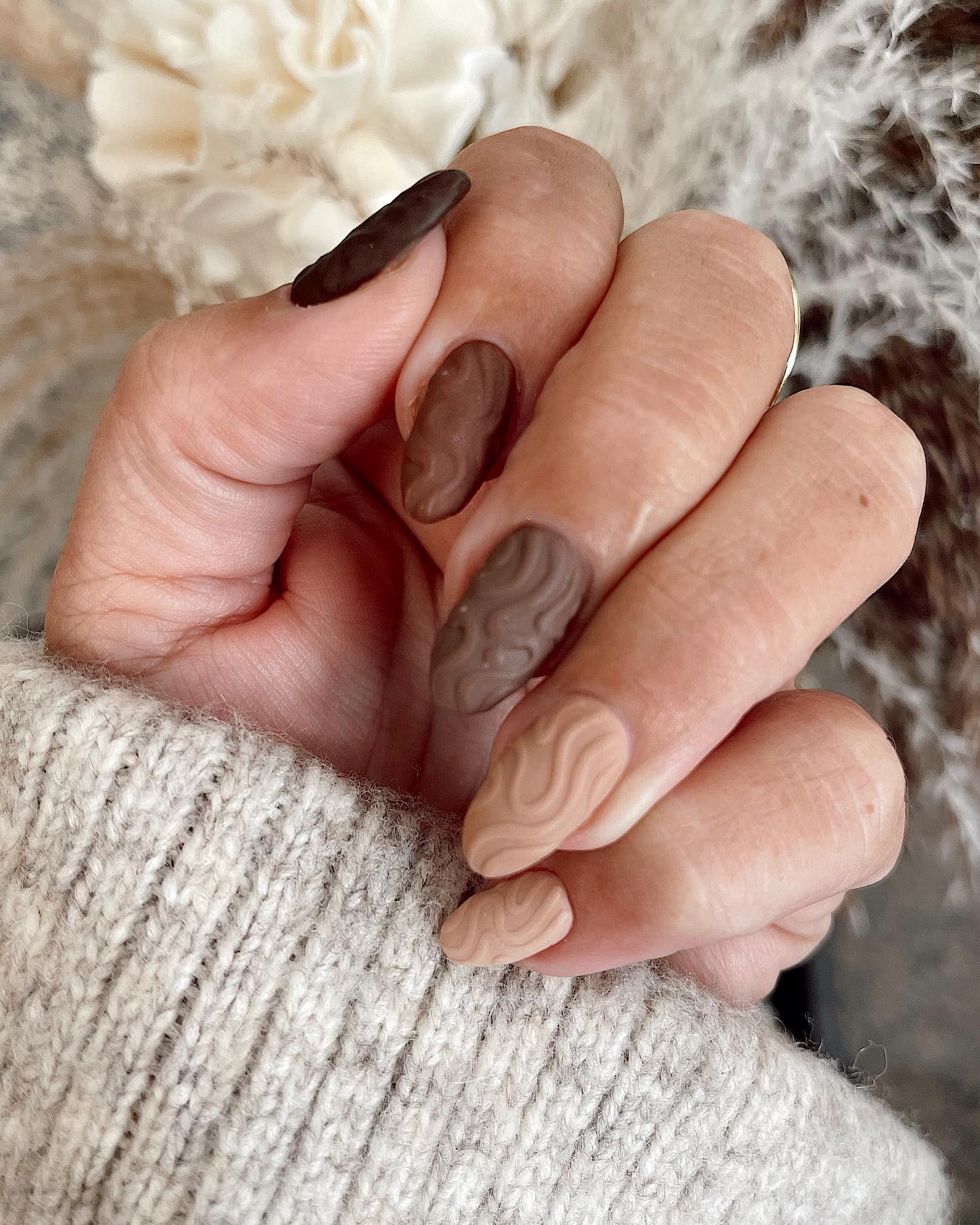 Chocolate Swirl Texture on Almond Nails sweater nail design