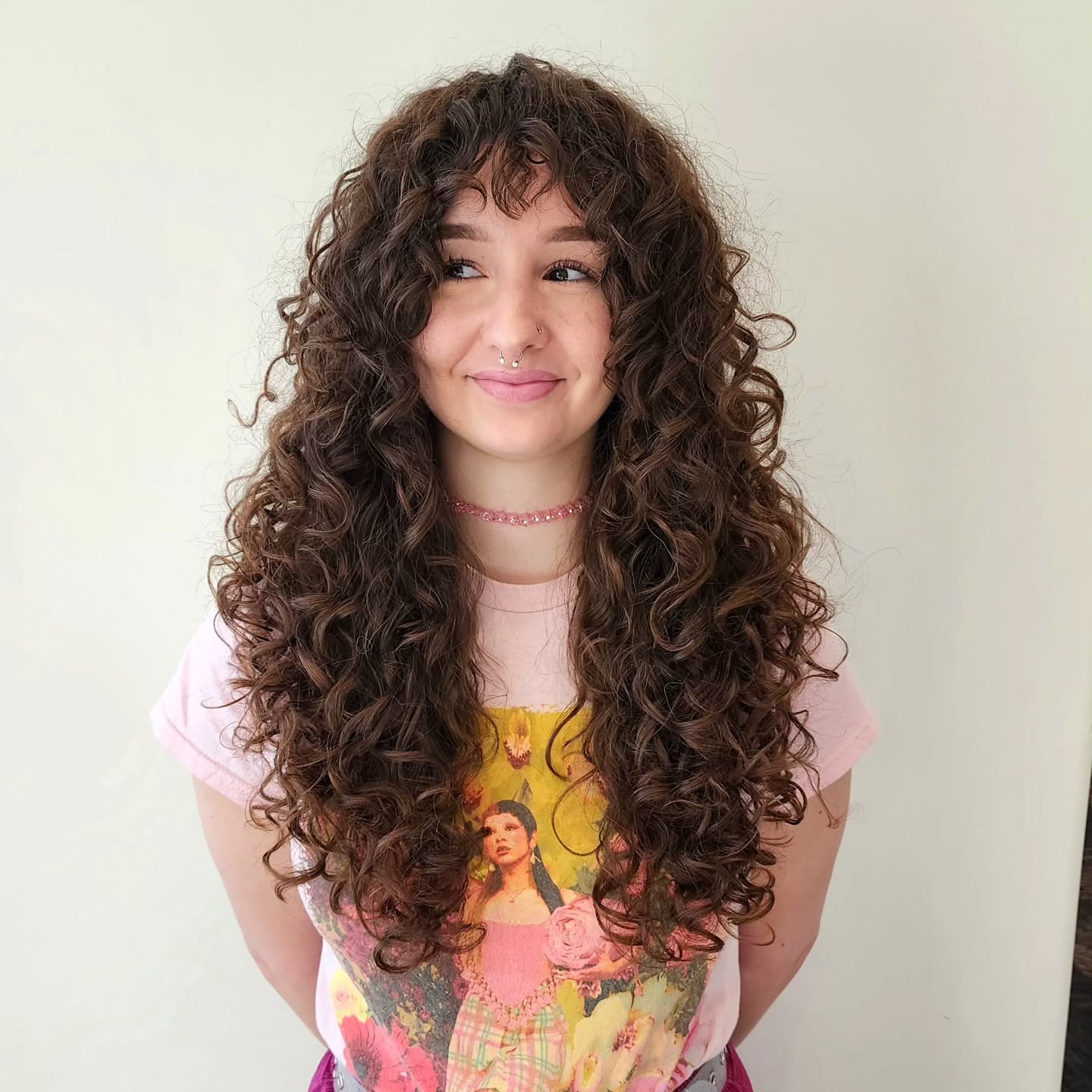 Long layered curls with a soft textured fringe