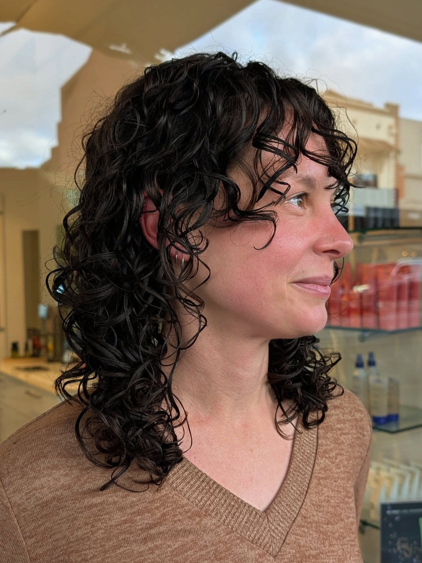 Textured curly layers with a soft fringe