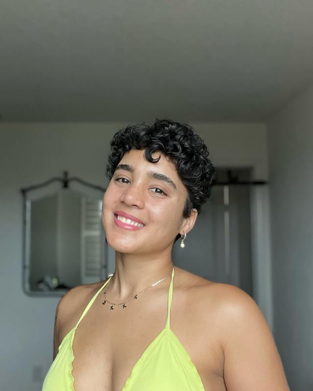 Thick and full curly pixie short hair hairstyle