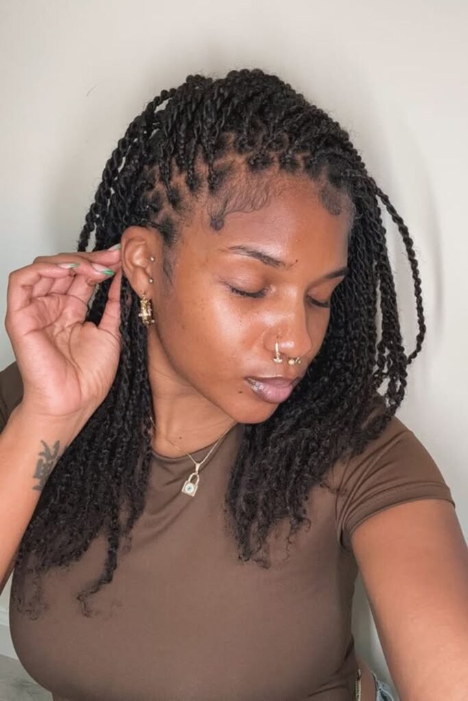 Two strand twists with a deep side part