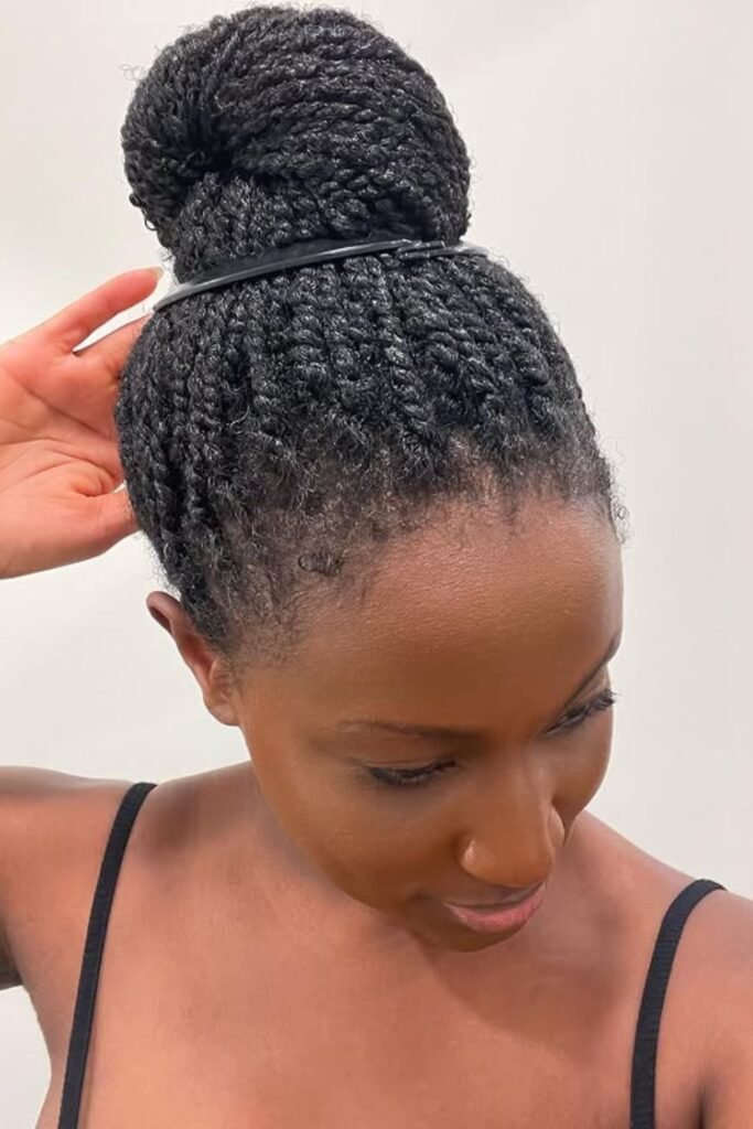 Two strand twists gathered into a high bun