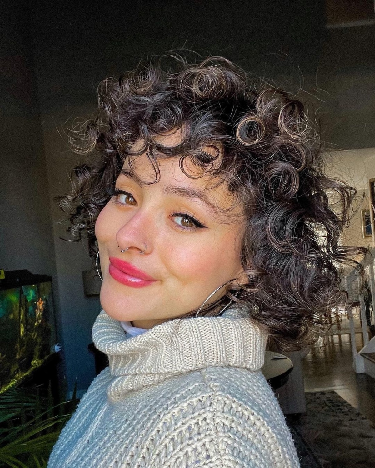 Very curly shag bob haircut
