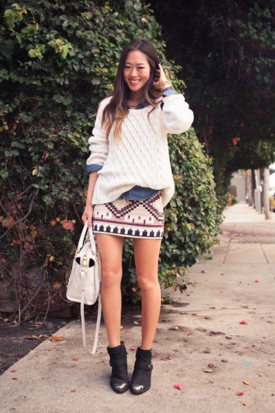 White Chunky Knit over a Blue Shirt with a Printed Mini Skirt sweater outfit for women
