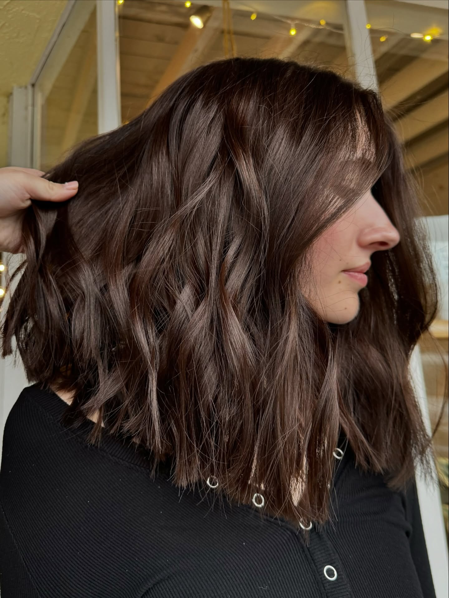 Windswept chocolate lob with curtain fringe
